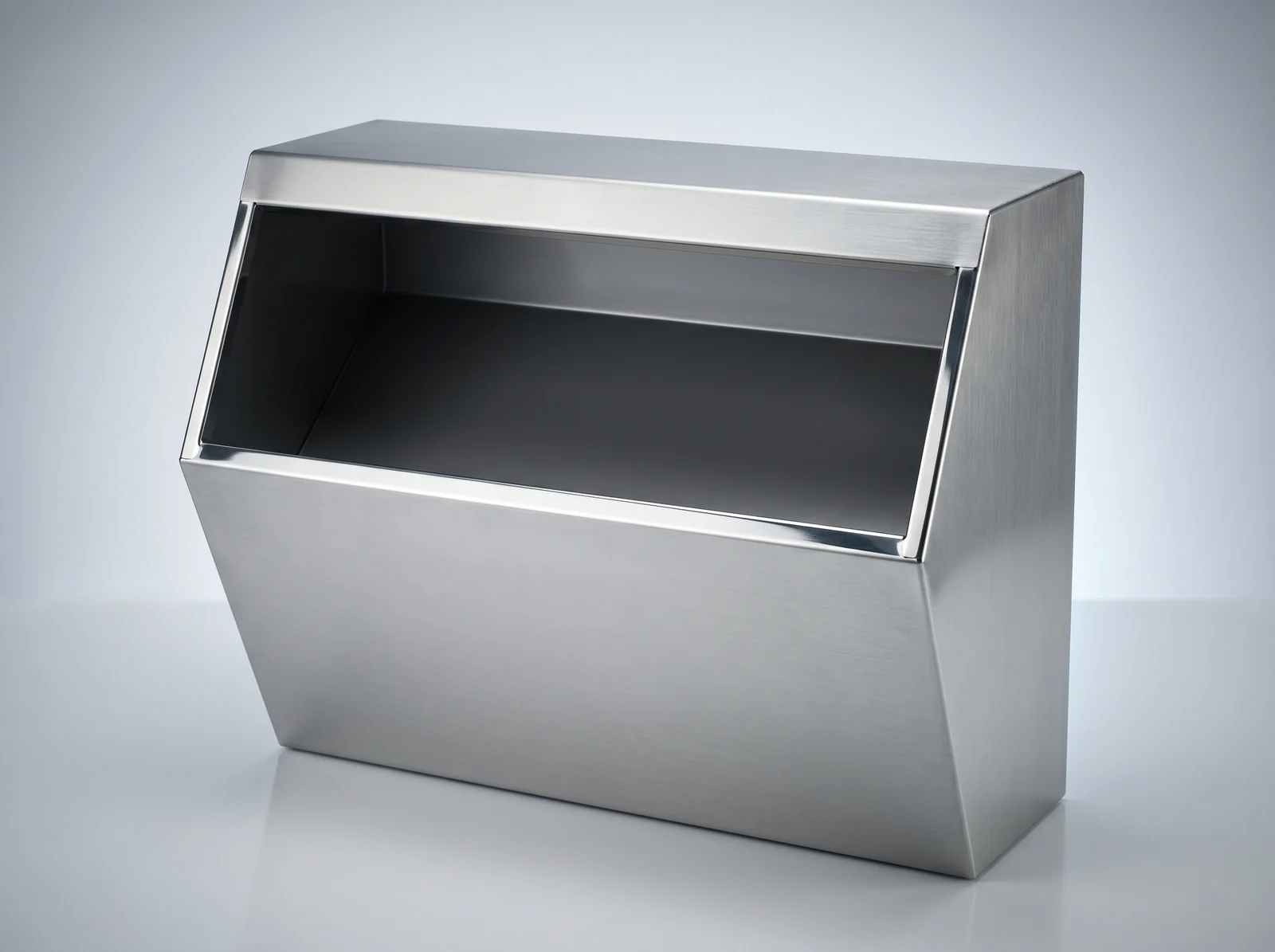 Three-quarter view of the B single-compartment stainless steel hairnet, mask and shoe-cover dispenser