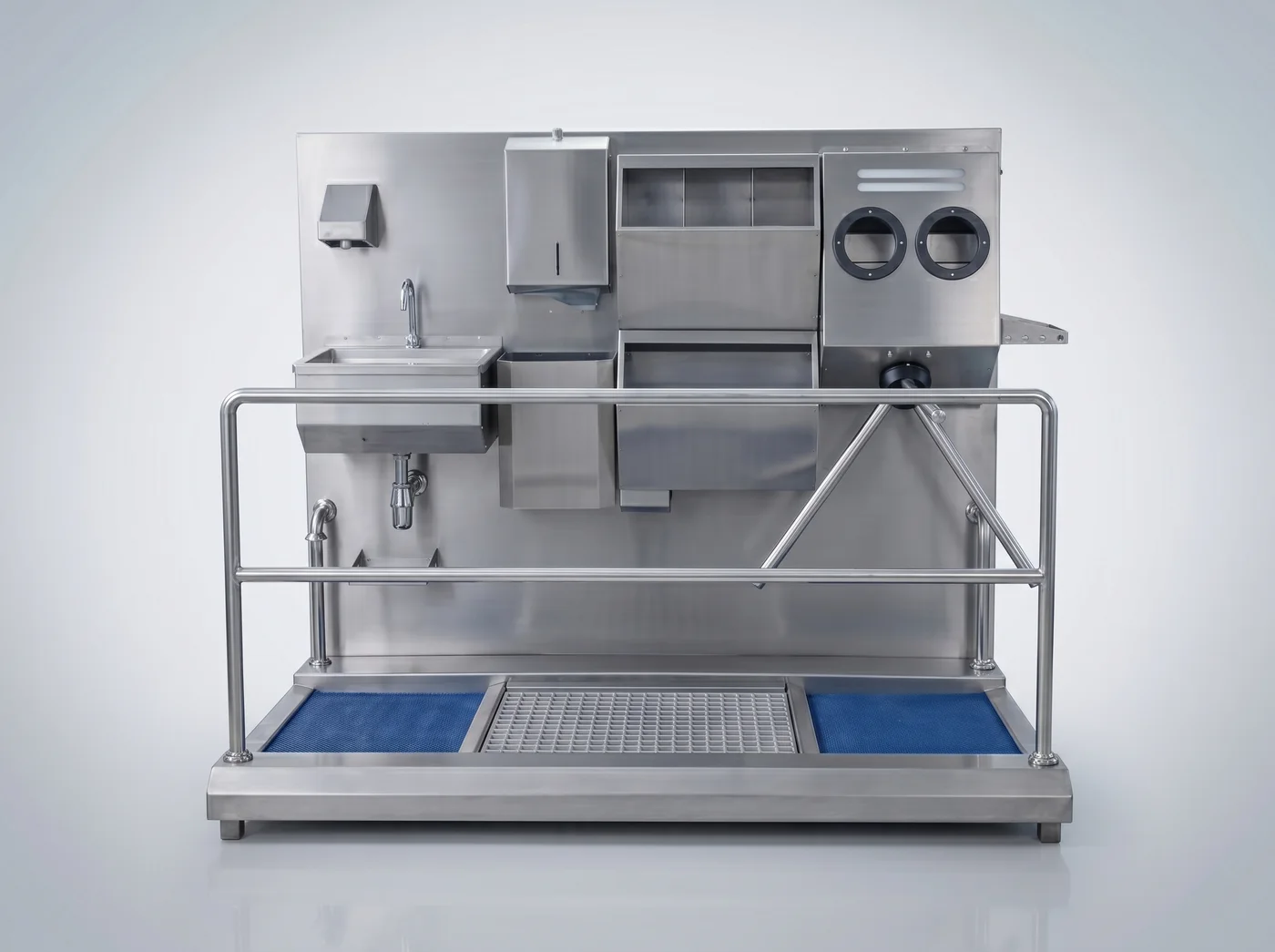 Front view of the HGE-L hygiene station showing the sink, hand disinfection and grated passage