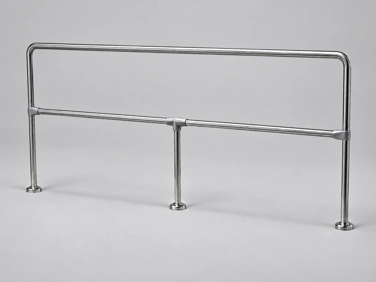 A stainless steel handrail with three vertical supports and horizontal bars